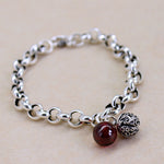 Bell Bracelet and Red Garnet