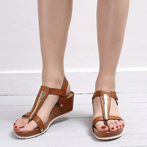 Fashionable sandal with metal and Velcro closure