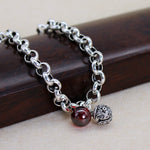 Bell Bracelet and Red Garnet