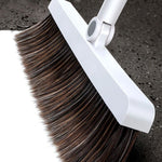 "Built-In Comb" Rotating Broom